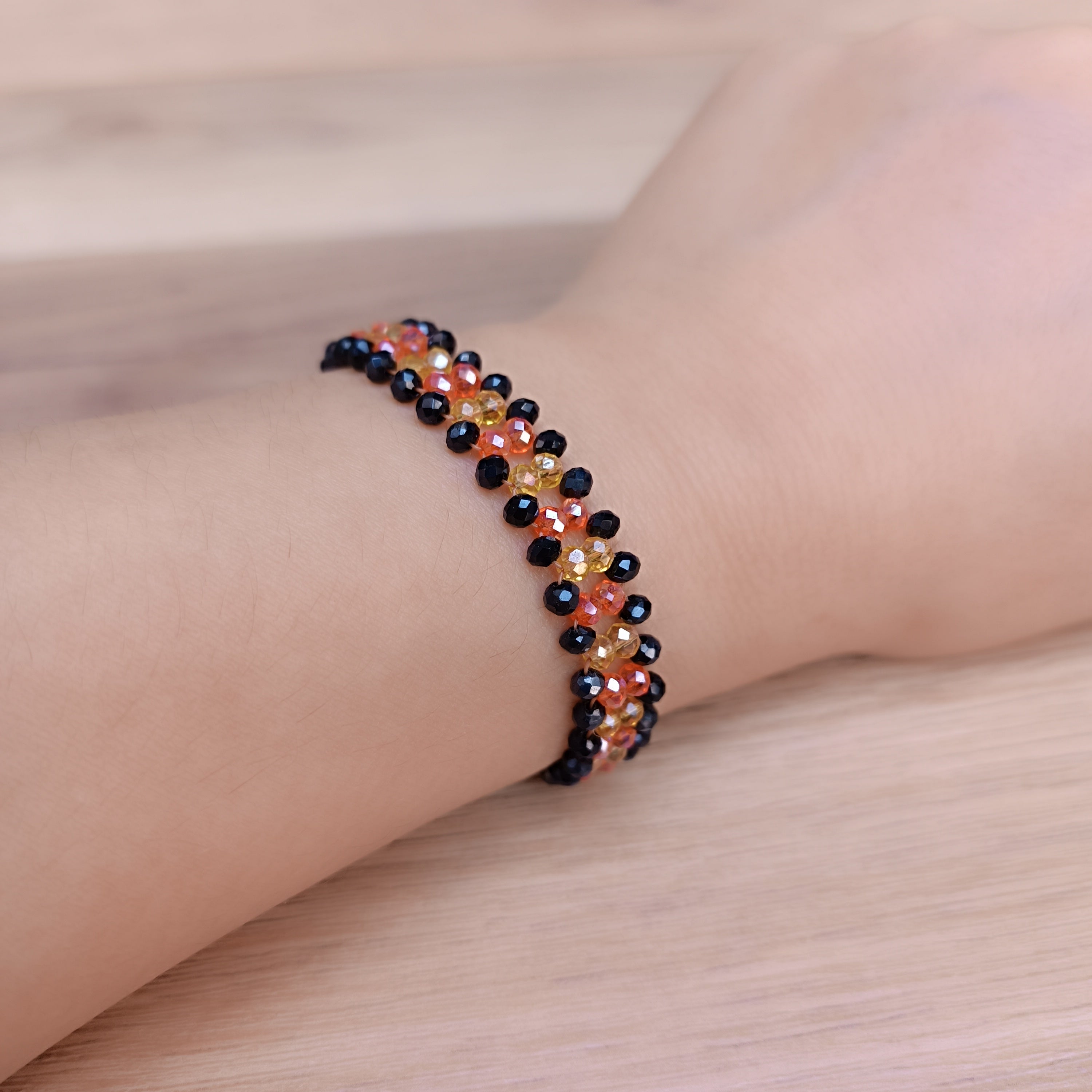 Handmade Crystal Beaded Bracelet – Black, Orange & Yellow