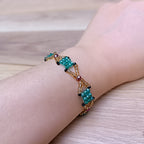 Handmade Bracelet with Emerald Green & Golden Glass Beads