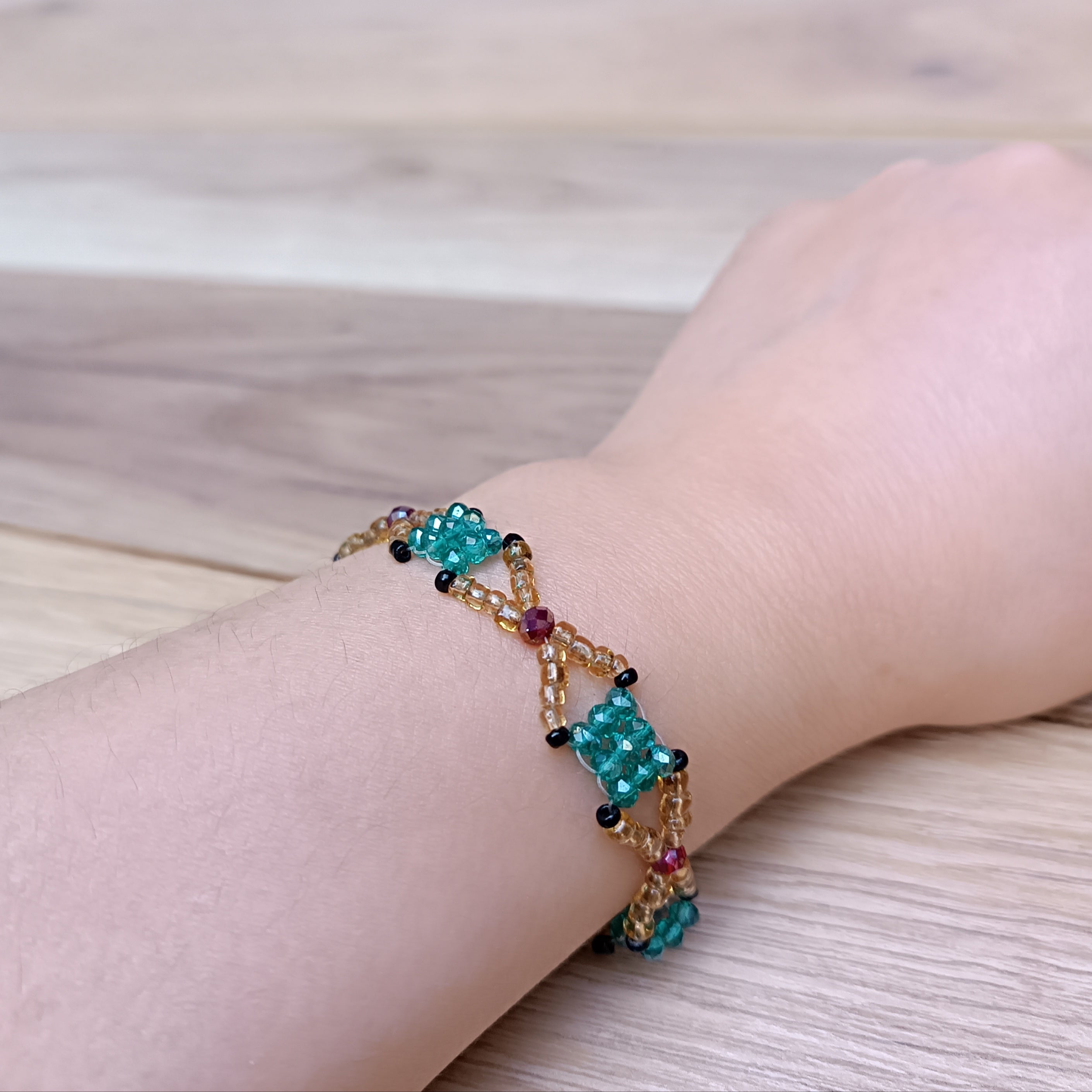 Handmade Bracelet with Emerald Green & Golden Glass Beads